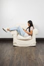 Relaxing and texting Royalty Free Stock Photo