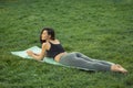 Relaxing after training. Outdoor sport concept on nature. Royalty Free Stock Photo