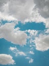 Relaxing view of cotton-like clouds in a blue sky Royalty Free Stock Photo
