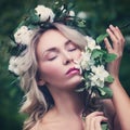 Relaxing Woman with Flowers Outdoors Royalty Free Stock Photo