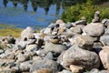 Relaxing, Zen Like View Including Stacks of Natural Rocks and a Lake during a Sunny Day Royalty Free Stock Photo