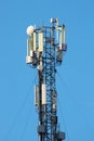Relay tower with many antennas against the sky Royalty Free Stock Photo