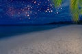 Released Lanterns on beach at night