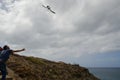 Releasing of a cory`s shearwater. Royalty Free Stock Photo