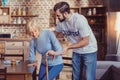 Reliable unshaken volunteer standing and helping. Royalty Free Stock Photo