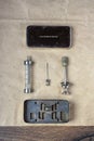 Reliable vintage metal reusable medical syringe disassembled, top view