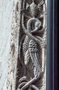 Italy. Bari. Basilica of San Nicola. Relief decorations of the jambs of the main portal. Elegant bird among racemes