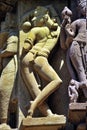 Relief carving of Apsara and Nayika on the wall of Lakshmana Temple