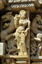 Relief carving of Apsara and Nayika on the wall of Lakshmana Temple