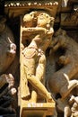 Relief carving of dancing Apsara on the wall of Lakshmana Temple