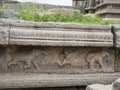 Relief carving of elephant trainer with two elephant on the wall of Vitthal Temple at Hampi