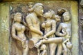 Relief carving of Erotic or Mithuna couples carved on the wall of Laksmana Temple