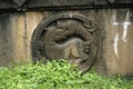 Relief carving of a snake and Yali a mythical creature