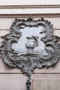 Relief on facade of old building, decorative vase, Prague, Czech