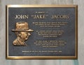 Relief in memory of Oklahoma University track star and coach John \'Jake\' Jacobs on the campus of Oklahoma University