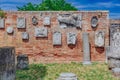 Relief sculptures on brick wall on the island of Torcello, Venice, Italy