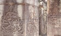 Relief of three dancers in the court of Angkor.