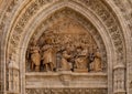 Relief in the tympanum of the Puerta de Palos on the East facade of the Seville Cathedral in Spain.