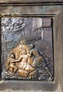 Reliefs on the bronze plaque at the statue of St John Nepomucen, Charles Bridge in Prague Royalty Free Stock Photo