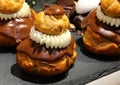 Religieuse is a French pastry made of two choux pastry cases