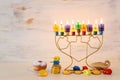 Religion image of jewish holiday Hanukkah background with menorah & x28;traditional candelabra& x29; and candles Royalty Free Stock Photo