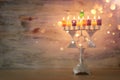 Religion image of jewish holiday Hanukkah background with menorah & x28;traditional candelabra& x29; and candles Royalty Free Stock Photo