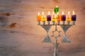 Religion image of jewish holiday Hanukkah background with menorah & x28;traditional candelabra& x29; and candles Royalty Free Stock Photo