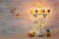 Religion image of jewish holiday Hanukkah background with menorah & x28;traditional candelabra& x29; and candles Royalty Free Stock Photo