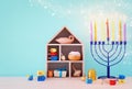 religion image of jewish holiday Hanukkah background with menorah & x28;traditional candelabra& x29;, spinning top and doughnut Royalty Free Stock Photo