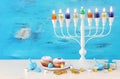 religion image of jewish holiday Hanukkah with white menorah & x28;traditional candelabra& x29; Royalty Free Stock Photo