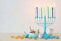 religion image of jewish holiday Hanukkah with white menorah & x28;traditional candelabra& x29;