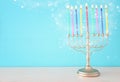 religion image of jewish holiday Hanukkah with white menorah & x28;traditional candelabra& x29; Royalty Free Stock Photo