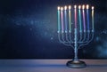 religion image of jewish holiday Hanukkah with white menorah & x28;traditional candelabra& x29;