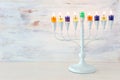 religion image of jewish holiday Hanukkah with white menorah & x28;traditional candelabra& x29; Royalty Free Stock Photo