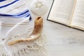 Religion image of Prayer Shawl - Tallit, Prayer book and Shofar horn jewish religious symbols. Rosh hashanah jewish New Year Royalty Free Stock Photo