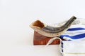 religion image of shofar (horn) on white prayer talit. Rosh hashanah (jewish New Year holiday) Royalty Free Stock Photo