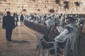 Religion Jew reading prayer book. Torah on the table in front of the wailing wall in the old city of Jerusalem Israel. JERUSALEM, Royalty Free Stock Photo