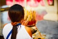 Religion. Woman Praying Buddha, Holding Incense Sticks At Temple