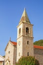 Religious architecture. Bell tower of Catholic Church of Saint Roch  St Roko . Montenegro, Tivat. Donja Lastva village Royalty Free Stock Photo