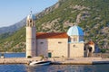 Religious architecture. Church of Our Lady of the Rocks Gospa od Skrpjela on sunny summer day. Montenegro, Bay of Kotor Royalty Free Stock Photo