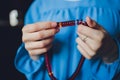 Religious Asian buddhist woman praying with hand holding rosary beads. Female buddhist disciple meditating, chanting