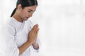 Religious Asian buddhist woman in white cloth praying and chanting Royalty Free Stock Photo