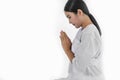 Religious Asian buddhist woman in white cloth praying and chanting Royalty Free Stock Photo