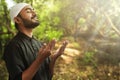 Religious asian muslim man pray