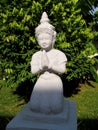 Religious asian statue of praying woman Royalty Free Stock Photo