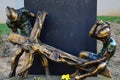 Religious bronze sculptural group of Eleventh Station Of The Cross from Way of Sorrows - Jesus is nailed on the cross.