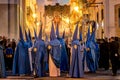 Religious brotherhood in procession in Huelva, Spain, during Easter.