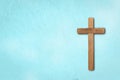 religious concept, Classic wood carved a cross on the blue background Royalty Free Stock Photo