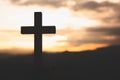 Religious concepts. Christian wooden cross on a background with dramatic lighting,  Jesus Christ cross, Easter, resurrection Royalty Free Stock Photo