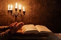 Religious female crossed hands in prayer with bible Royalty Free Stock Photo